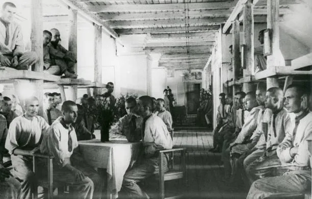A stark image of a Soviet Gulag labor camp, where millions were imprisoned under Stalin's regime. Fo